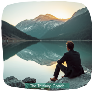 Cortical Thinking: calm leader beside a still lake, symbolizing relaxation and strategic clarity